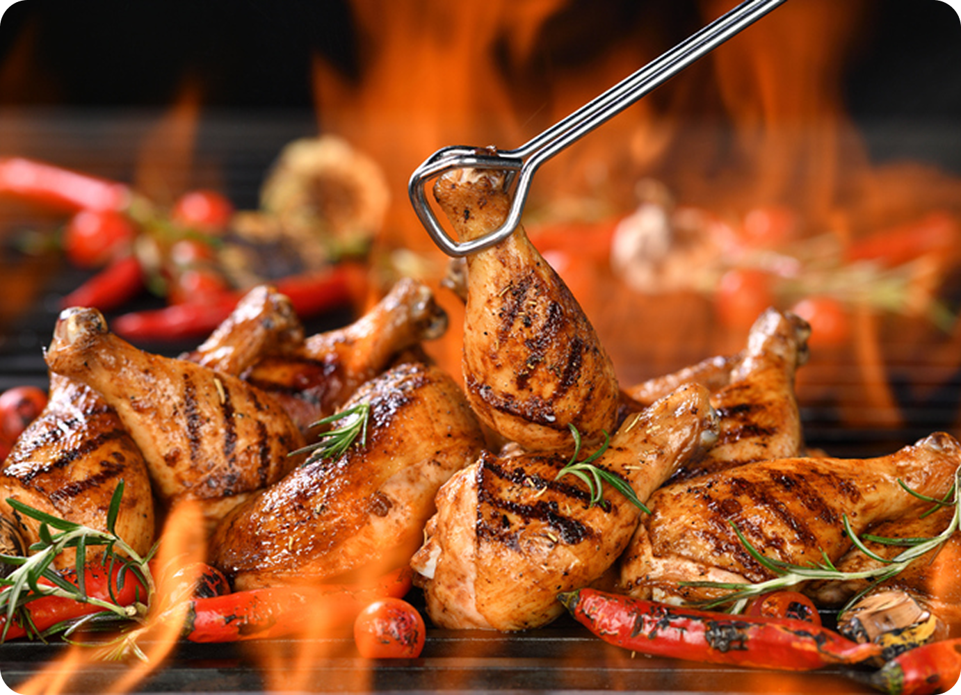 Barbecue chicken with flames and spices